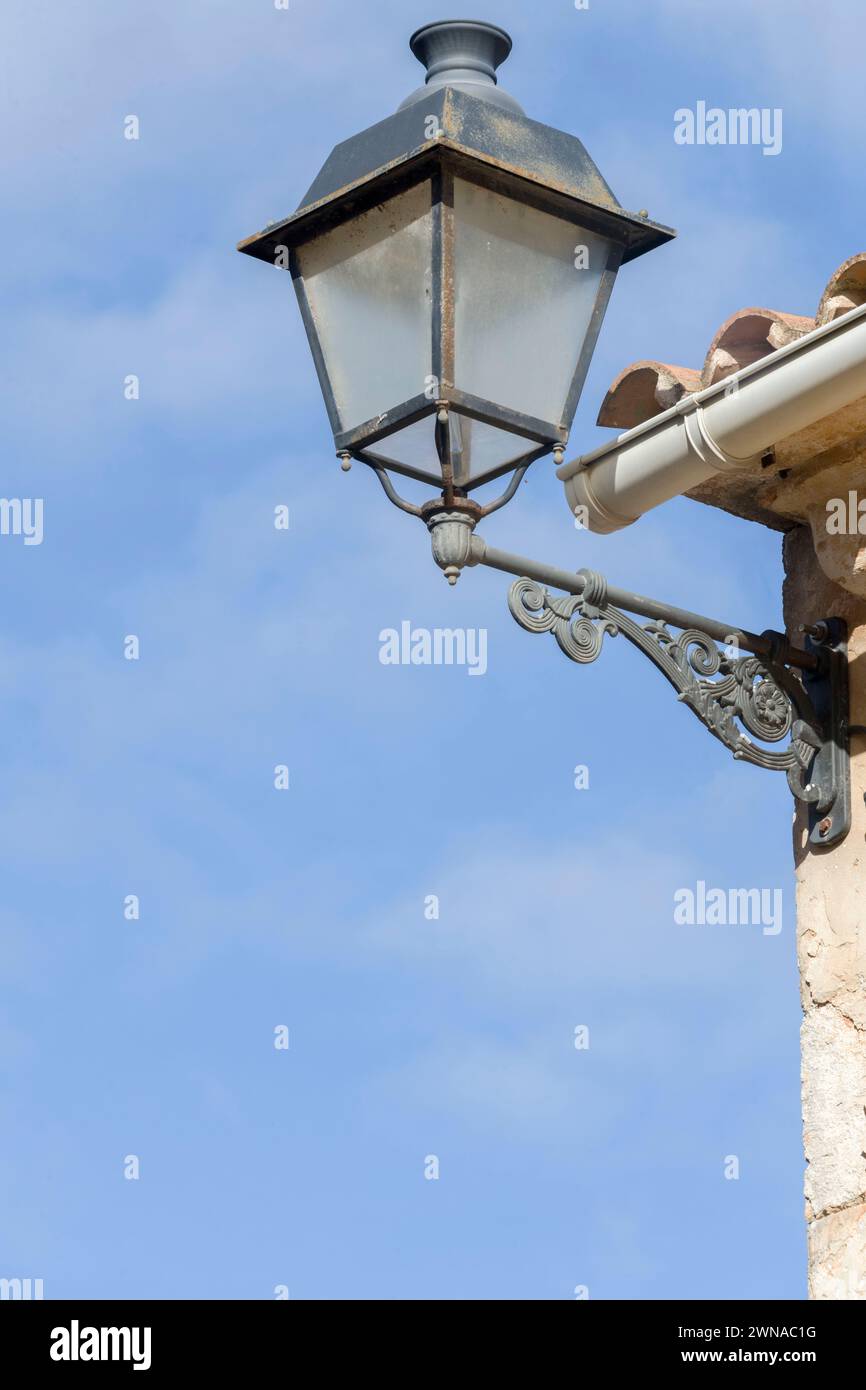 Lantern on the corner of a house Stock Photo