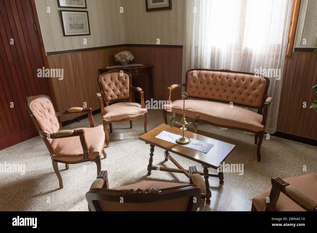 View of the old church-run home called 'Es Convent' in Porto Cristo, Mallorca. The meeting room. Stock Photo
