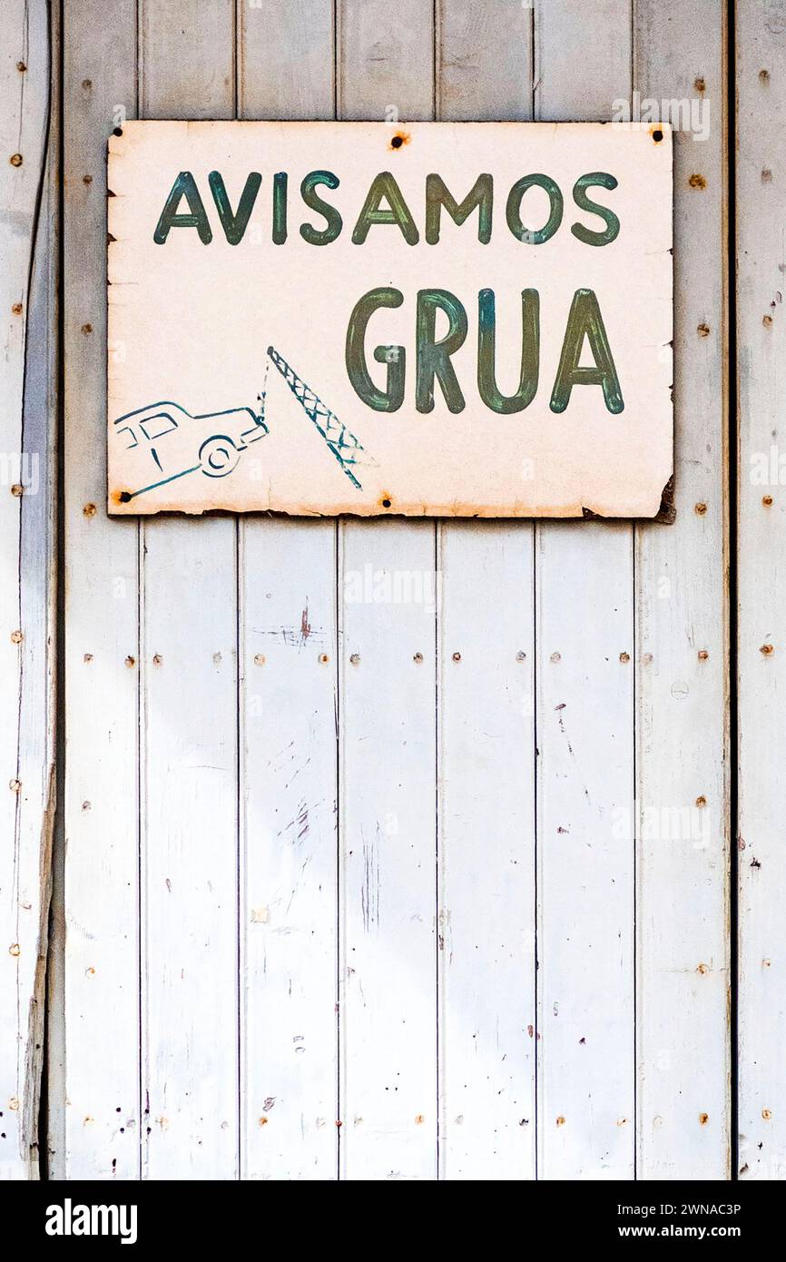 Warning sign at a garage entrance in Porto Cristo, Mallorca. Stock Photo