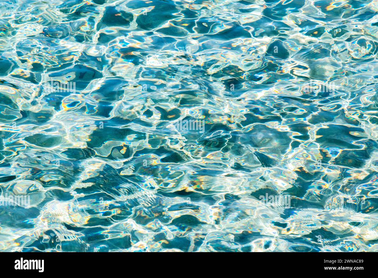 Aquagraphy of the play of colours in the sea. Stock Photo