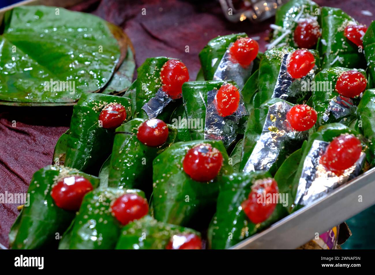 Sweet paan, meetha pan, Betel leaves mouth Freshener, Traditional indian dessert Paan made with Betel leaf and other ingreditients is eaten as a desse Stock Photo