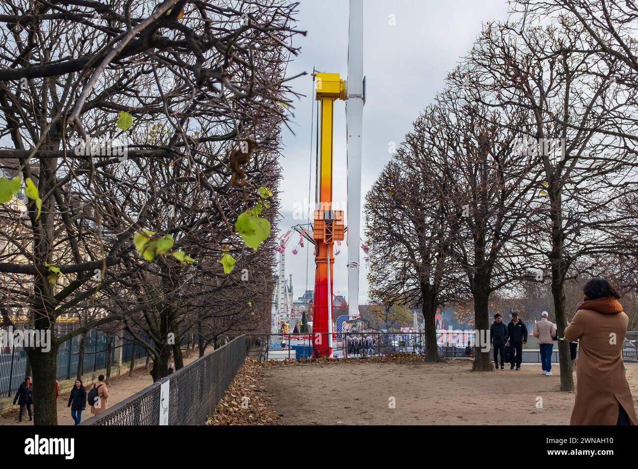 Funlang Boost Ride Paris, France. People enjoying a walk in the Jardin des Tuileries, with ...
