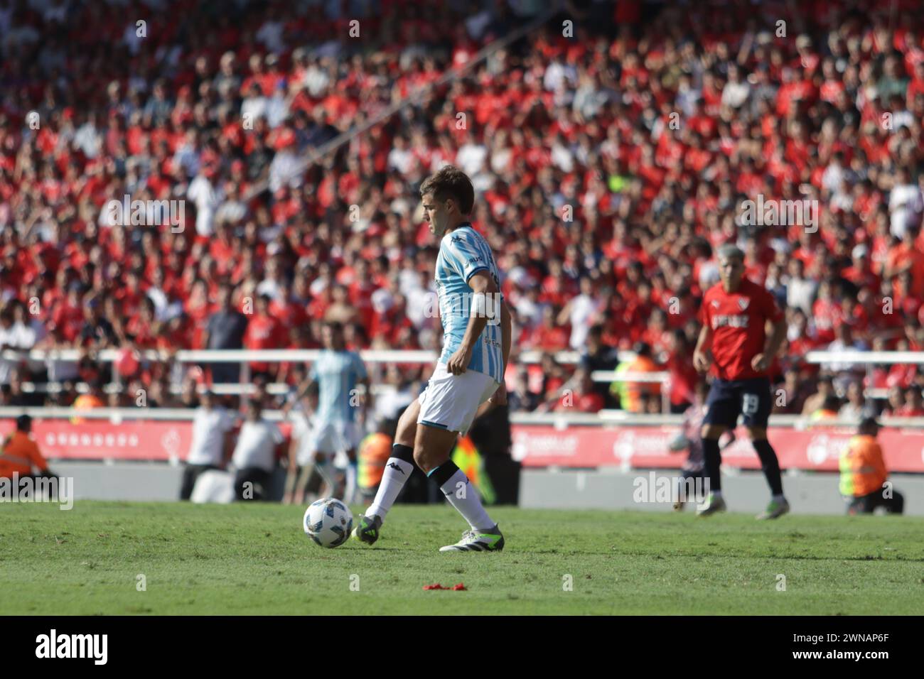 Avellaneda, Argentina, 24, February, 2024. Santiago Sosa passes the ball during the match between Independiente vs Racing Club. Stock Photo