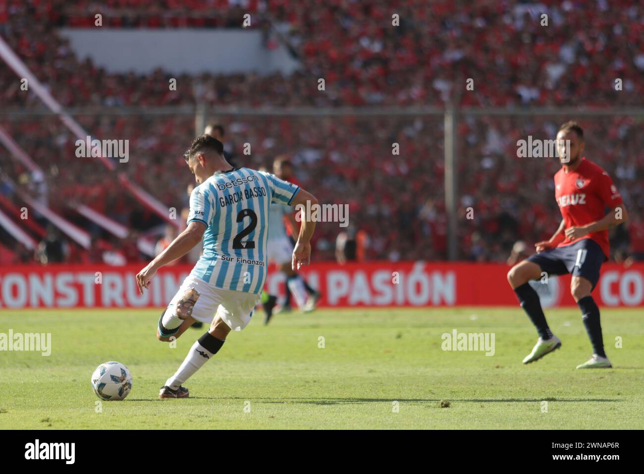Avellaneda, Argentina, 24, February, 2024. Agustin Garcia Basso passes the ball during the match between Independiente vs Racing Club. Stock Photo