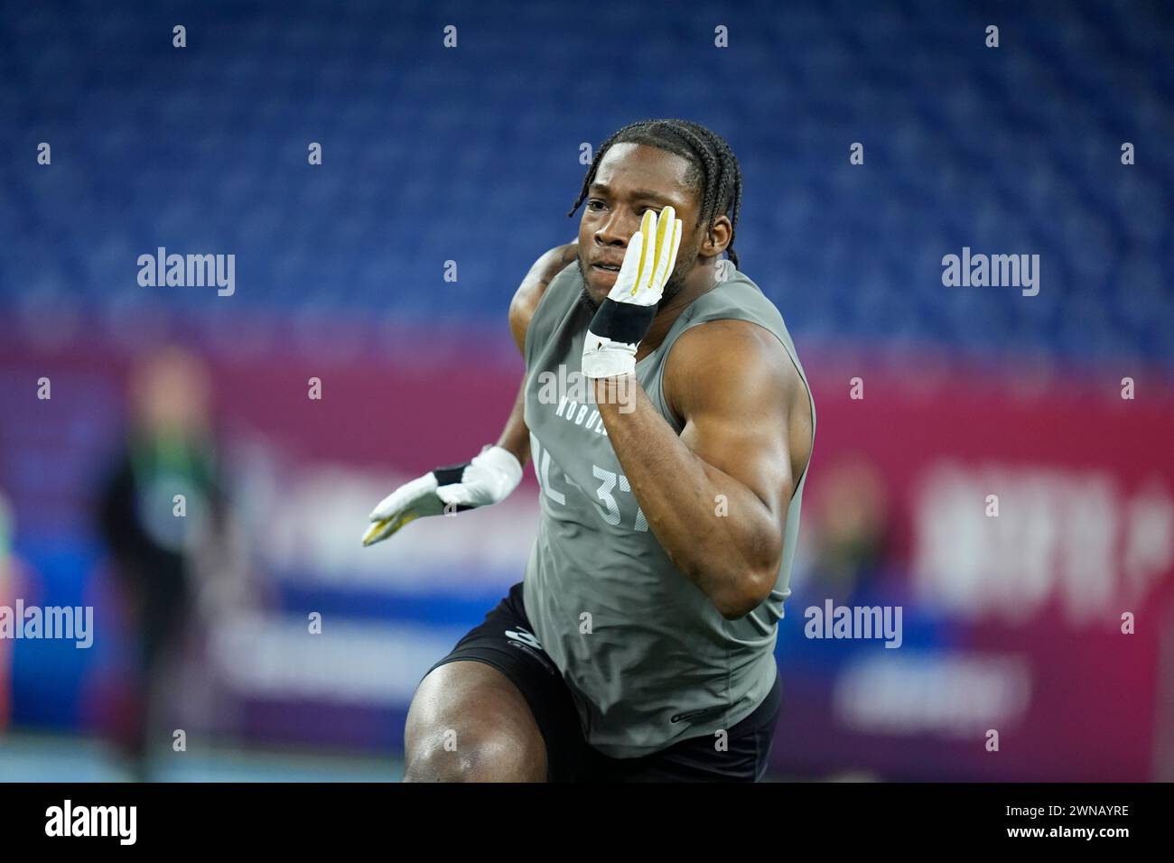 Notre Dame defensive lineman Javontae JeanBaptiste runs a drill at the