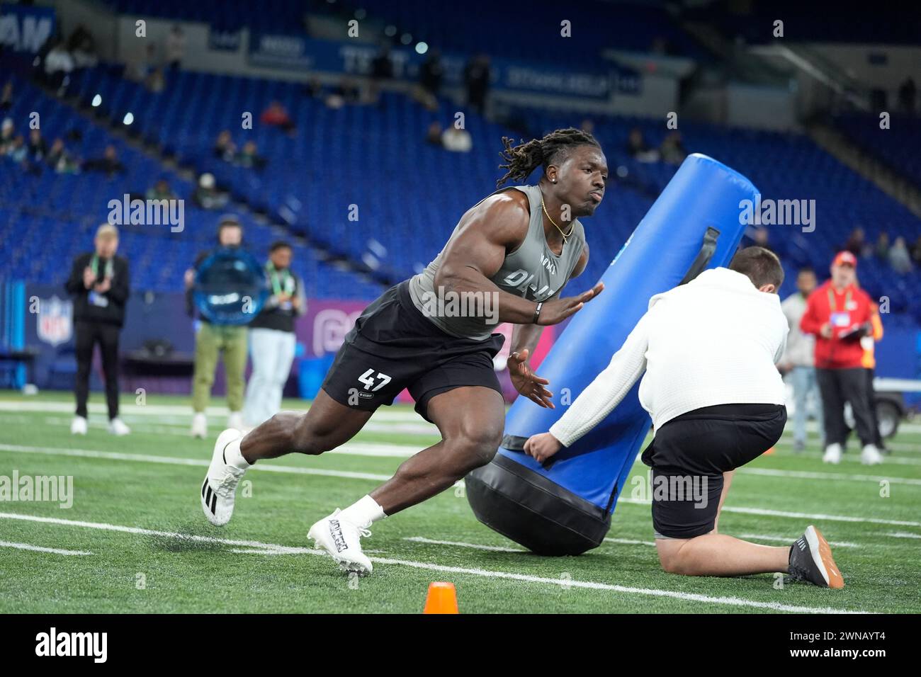 Troy defensive lineman Javon Solomon runs a drill at the NFL football