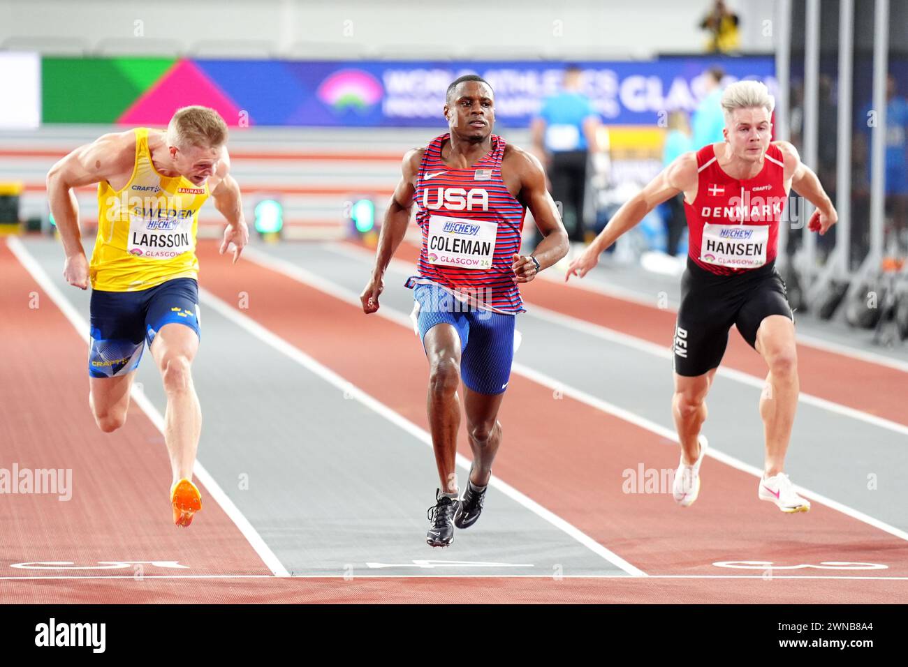 USA's Christian Coleman (centre) finishes first in the Men's 50 Metres ...