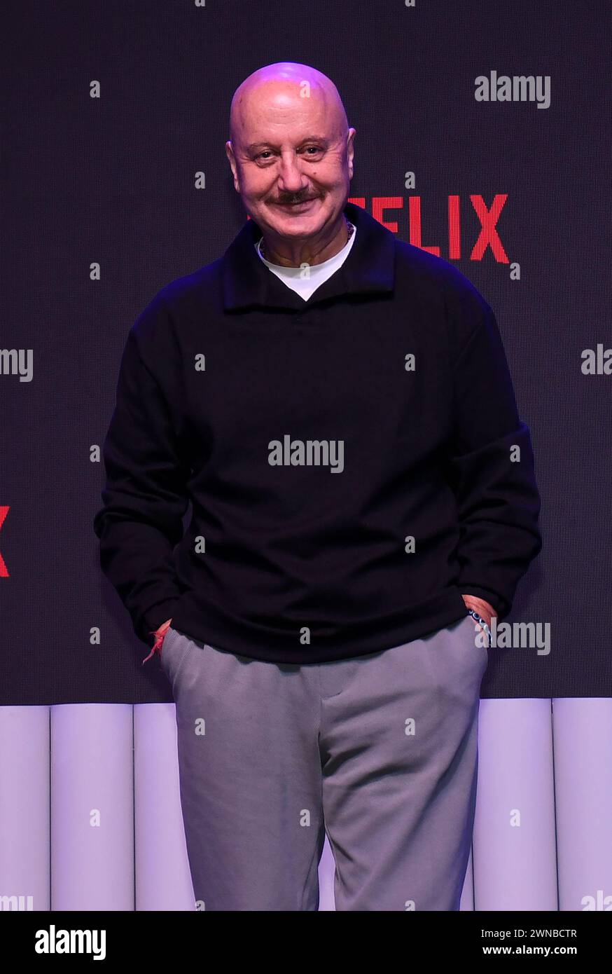 Bollywood actor Anupam Kher pose for a photo at an event to unveil his upcoming film 'Vijay 69' on Netflix in Mumbai. Stock Photo