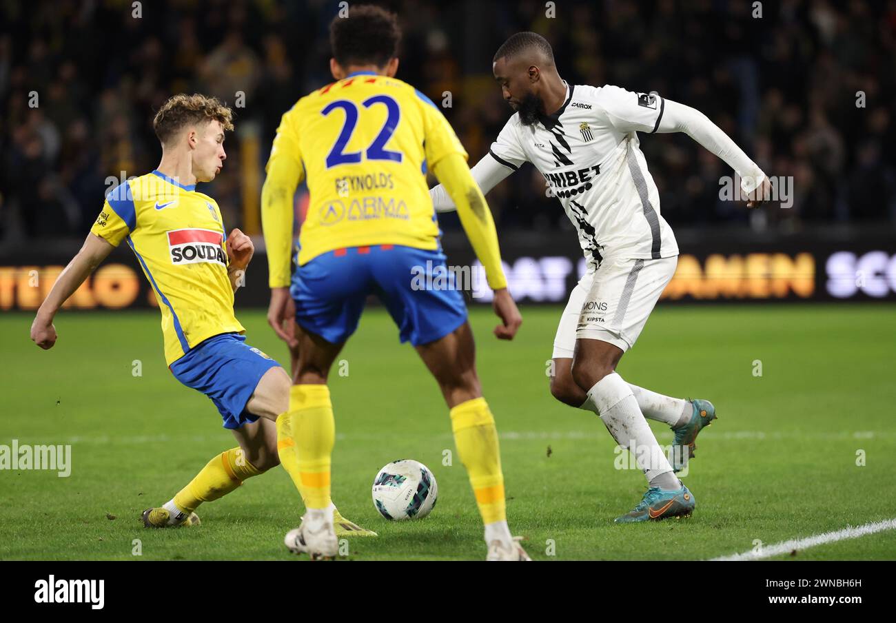 Charleroi's Isaac Mbenza fights for the ball during a soccer match