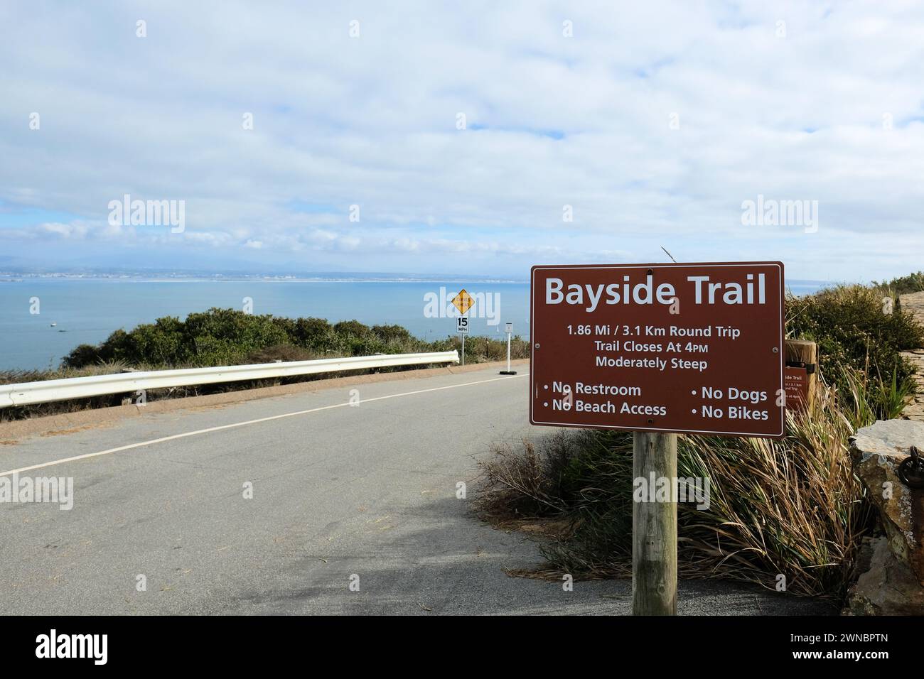 Sign at the start of the Bayside Trail near the old Point Loma lighthouse at Cabrillo National Monument overlooking San Diego Bay, California. Stock Photo