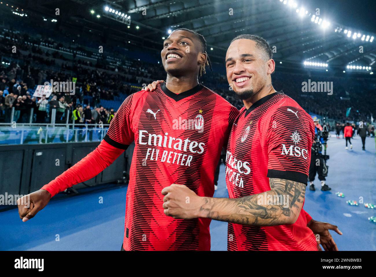 Rome, Italy. 01st Mar, 2024. Milanâ&#x80;&#x99;s Portuguese forward Rafael Leao and Milanâ&#x80;&#x99;s Swiss forward Noah Okafor celebrate victory match during the Serie A football match SS Lazio vs AC Milan at Olimpico Stadium on March 01, 2024, in Rome. Credit: Independent Photo Agency/Alamy Live News Stock Photo
