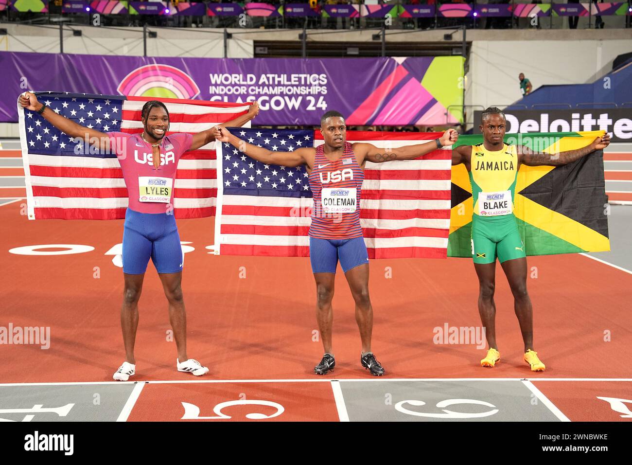 USA's Christian Coleman (centre) celebrates winning gold in the Men's ...