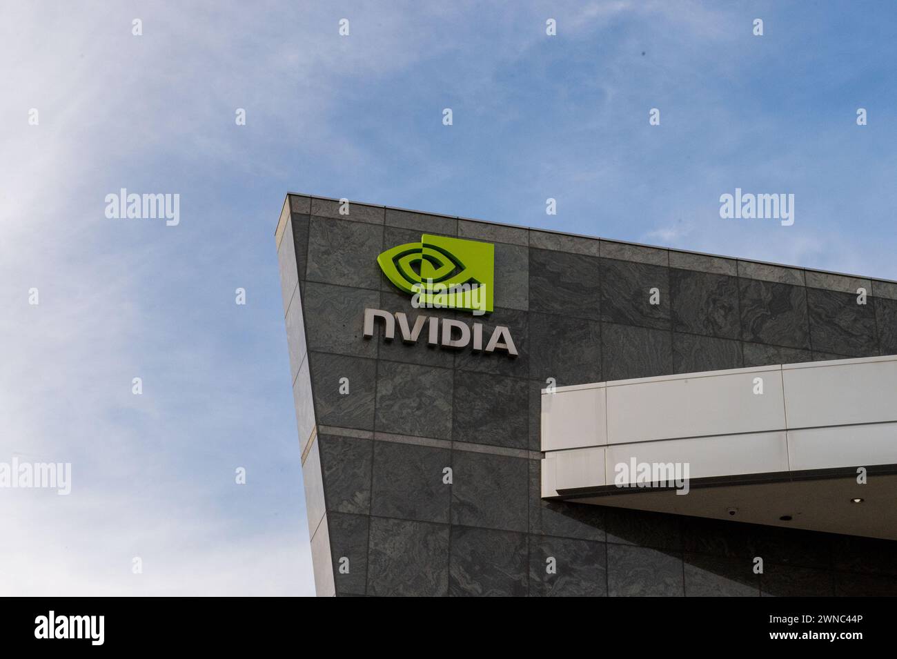 Santa Clara, USA. 23rd Feb, 2024. The logo of the chip company Nvidia can be seen at its headquarters in Silicon Valley. The company's market capitalization exceeded the two trillion dollar mark for the first time at the close of trading on Friday. Credit: Andrej Sokolow/dpa/Alamy Live News Stock Photo