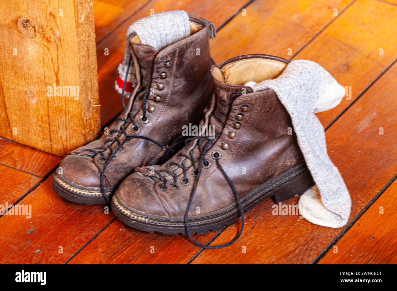 Old Hiking Boots With Boot Socks And Hip Flask On A Wooden Shelf Stock  Photo - Download Image Now - iStock