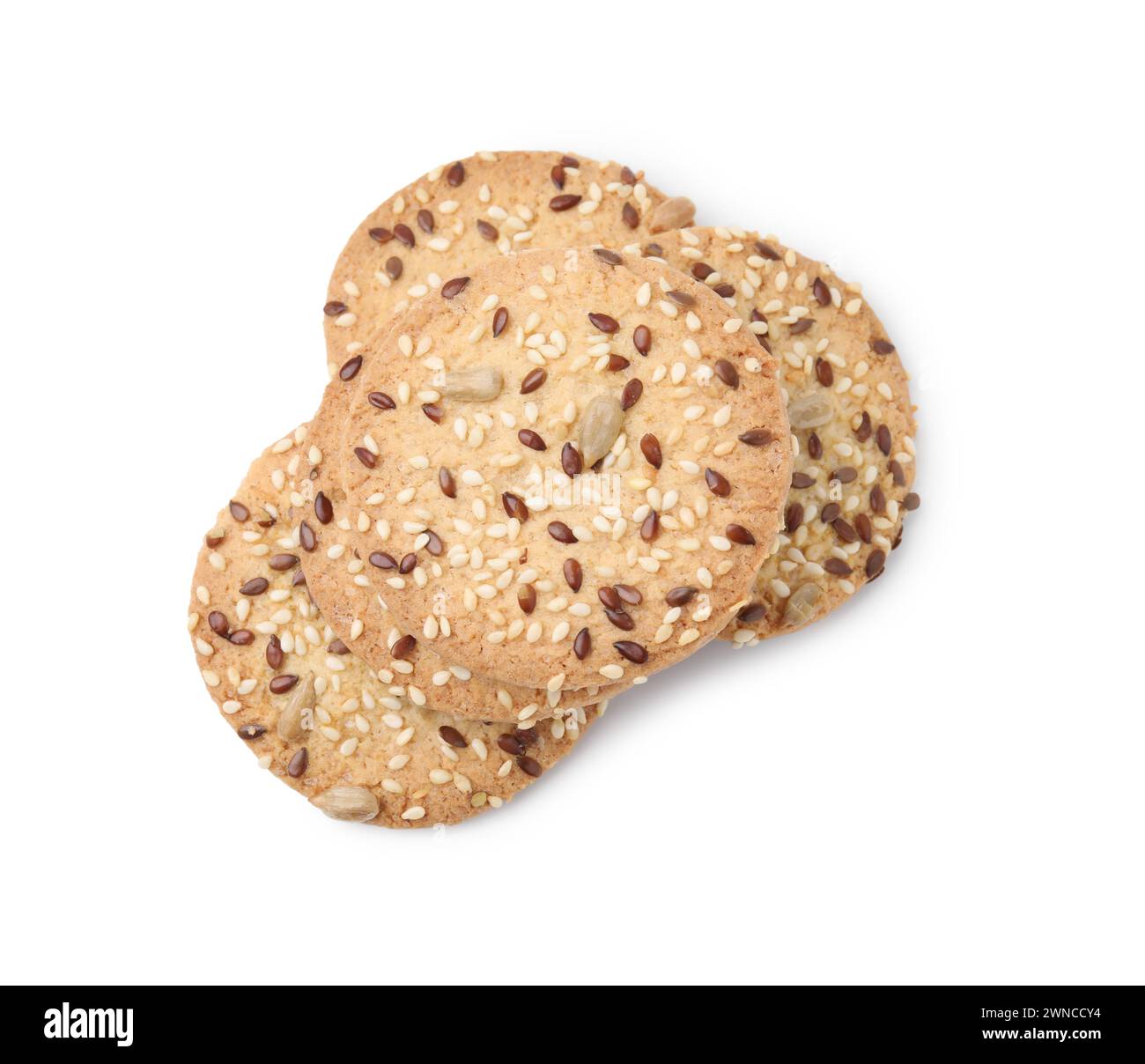 Round cereal crackers with flax, sunflower and sesame seeds isolated on ...