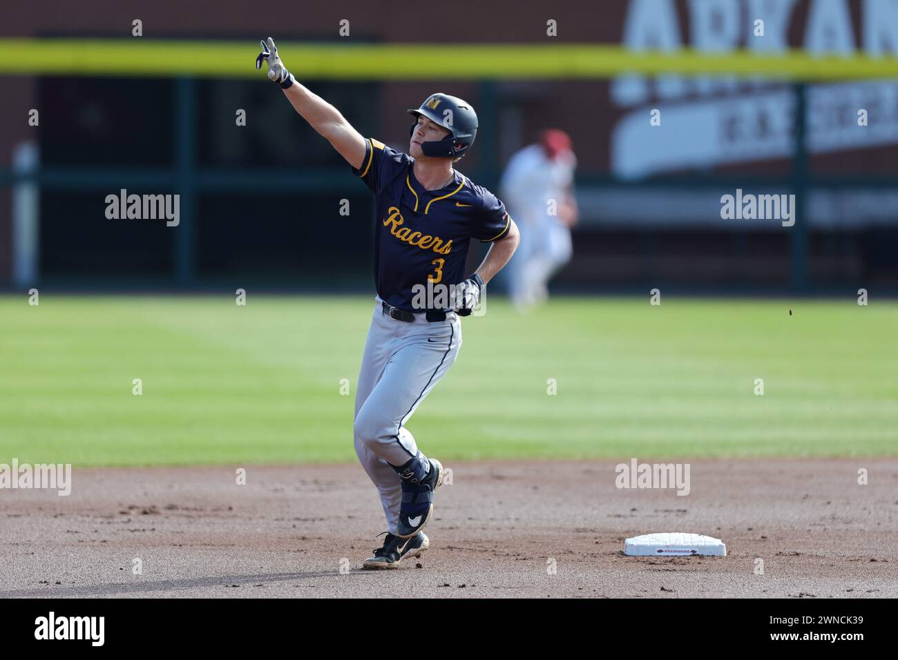 March 1, 2024: Racers Drew Vogel #3 singles to the stands as he rounds second base following a first inning home run.Arkansas defeated Murray State 5-1 in Fayetteville, AR. Richey Miller/CSM(Credit Image: © Richey Miller/Cal Sport Media) Stock Photo