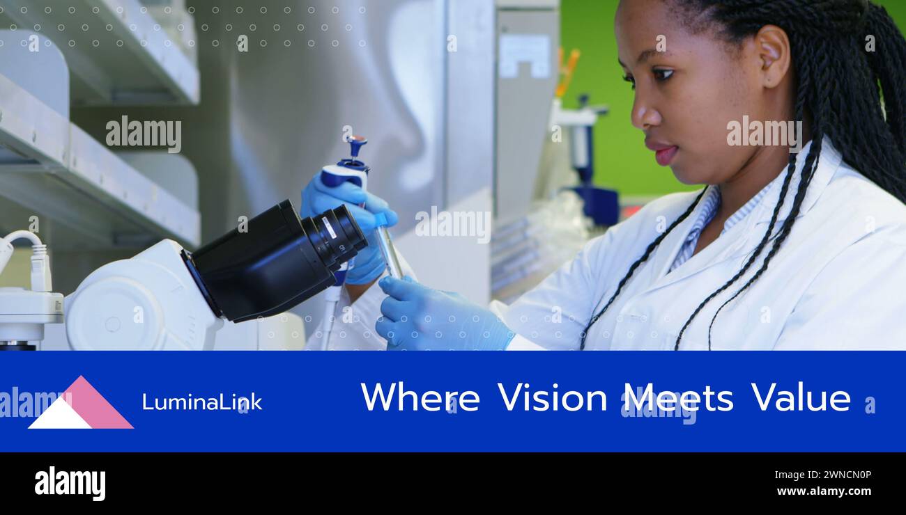 Promote scientific expertise, a researcher using a microscope Stock Photo