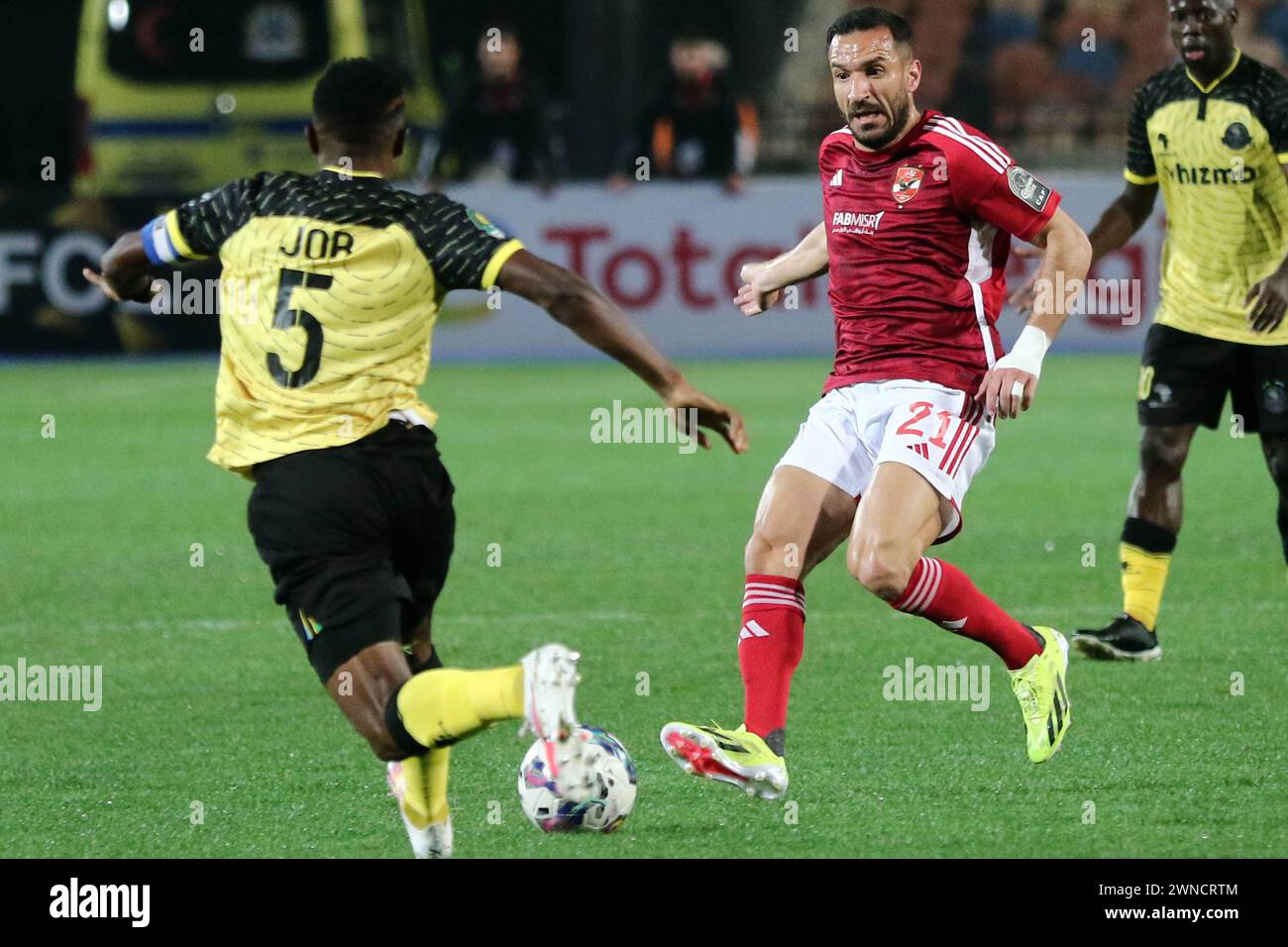 Cairo, Egypt. 1st Mar, 2024. Ali Maaloul (C) of Al Ahly competes during the CAF Champions League Group D football match between Al Ahly of Egypt and Young Africans of Tanzania in Cairo, Egypt, March 1, 2024. Credit: Ahmed Gomaa/Xinhua/Alamy Live News Stock Photo