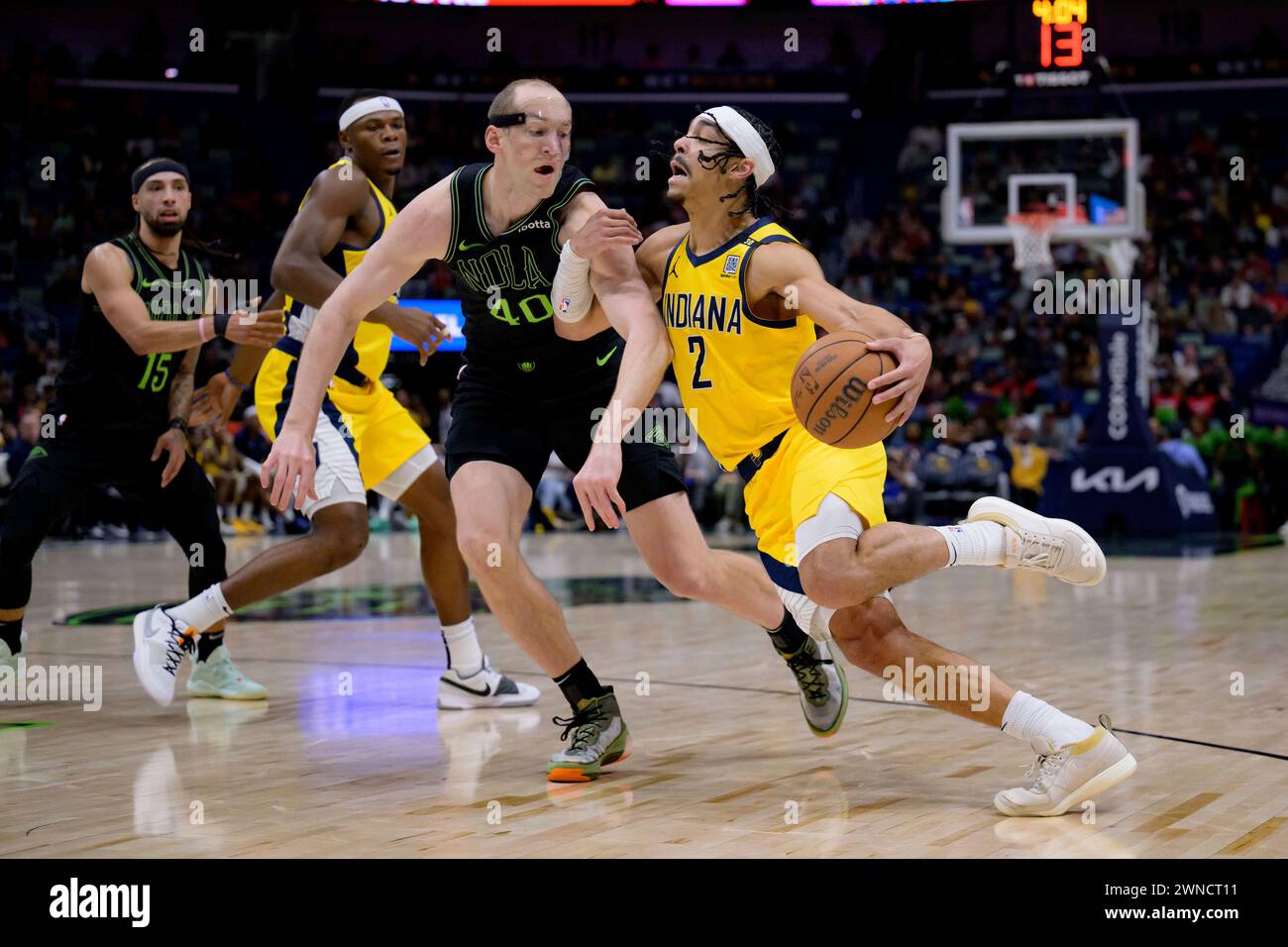 Indiana Pacers guard Andrew Nembhard (2) tries to drive around New
