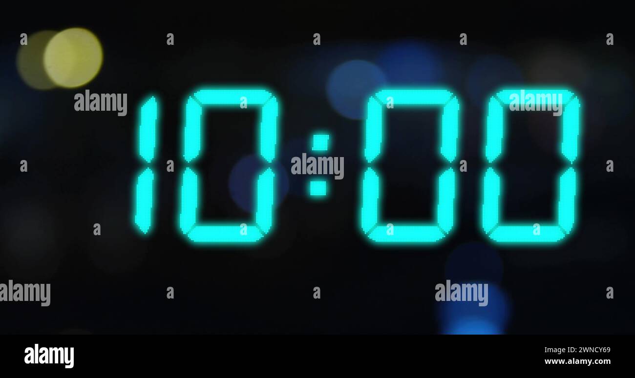 Image of blue digital clock timer changing on black background Stock Photo