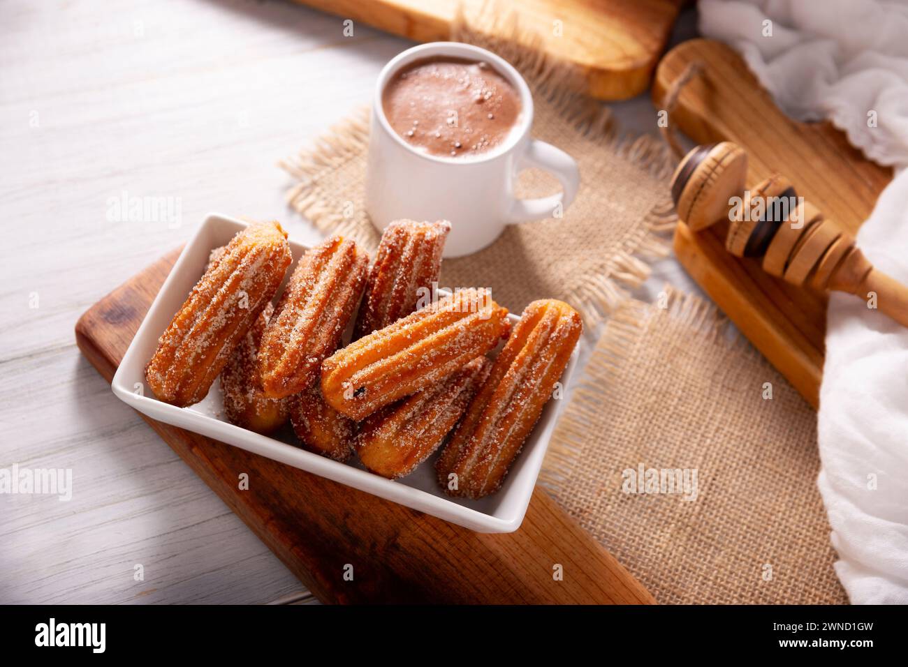 Churros. Fried wheat flour dough, a very popular sweet snack in Spain, Mexico and other countries where it is customary to eat them for breakfast or s Stock Photo