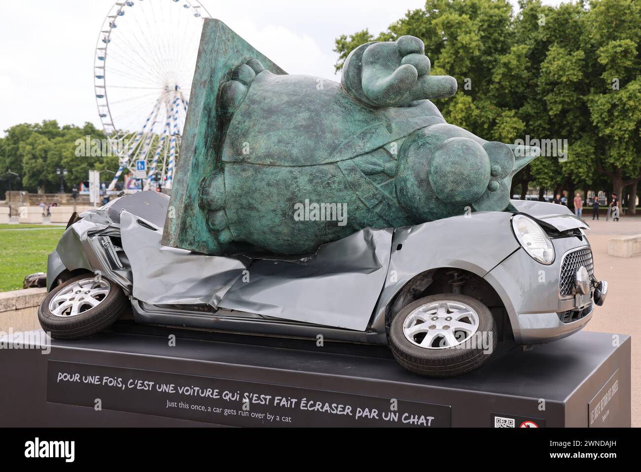 The fair return of things. For once it was a car that was run over by a cat. Exhibition on the quays of Bordeaux on the banks of the Garonne river of Stock Photo