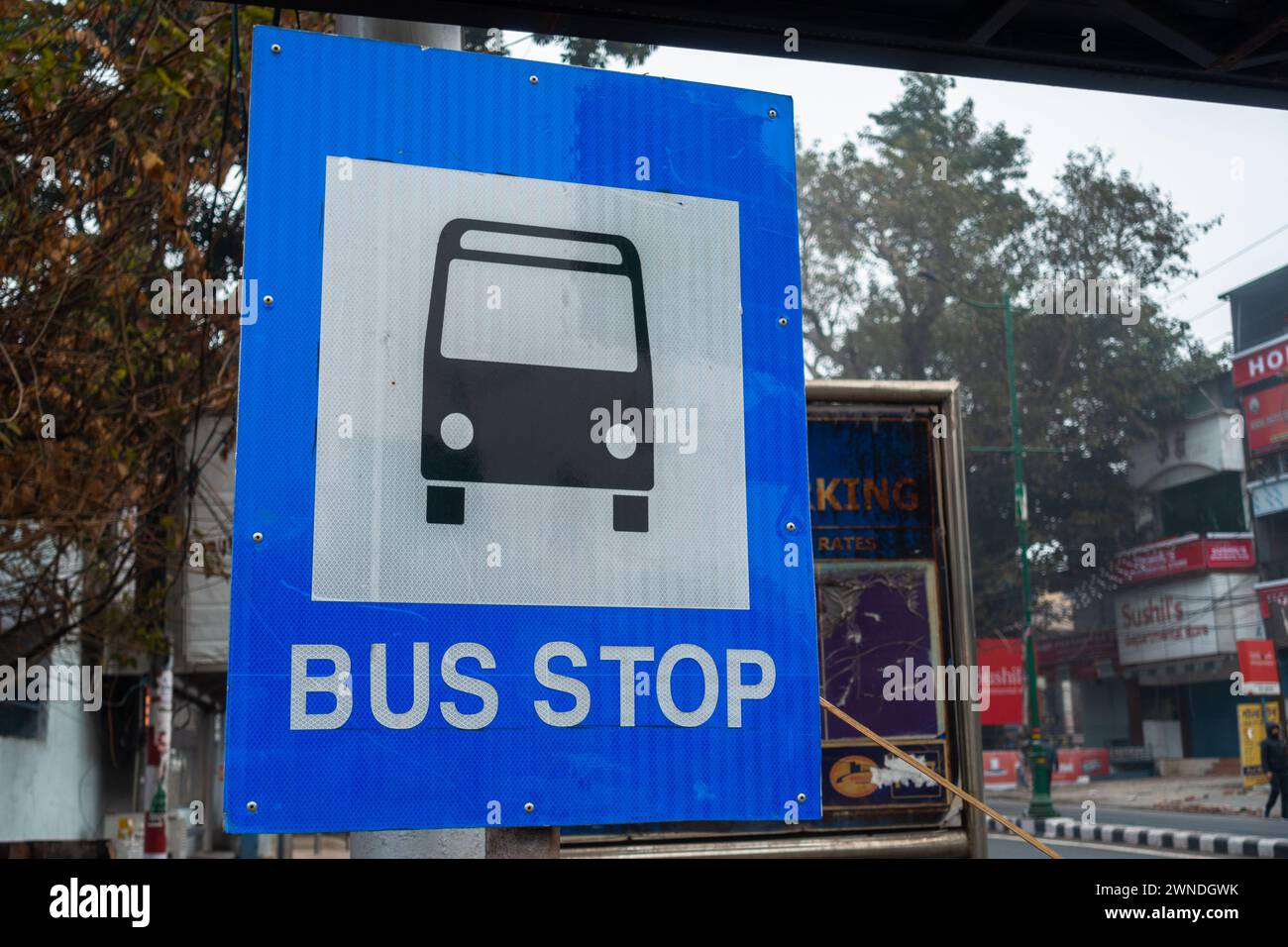 Jan.11th 2024, Uttarakhand India. City Transit: Bus Stop Sign on Rajpur Road, Dehradun, Uttarakhand, India. Urban Transportation Stock Photo