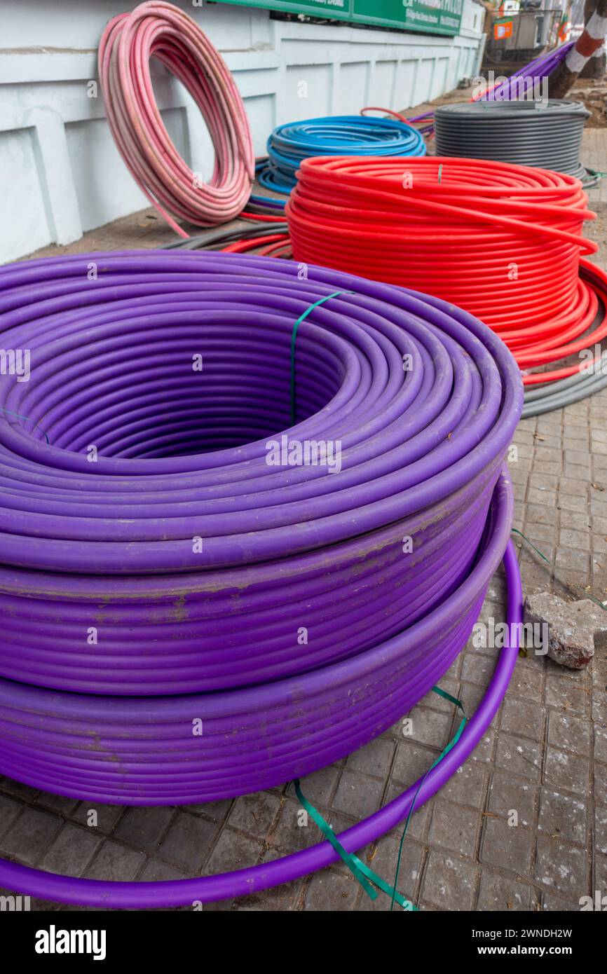 Jan.11th 2024, Uttarakhand IndiaSmart City Infrastructure: Colorful Fibre Pipe Bundles for Underground Wiring, Rajpur Road, Dehradun, Uttarakhand, Ind Stock Photo
