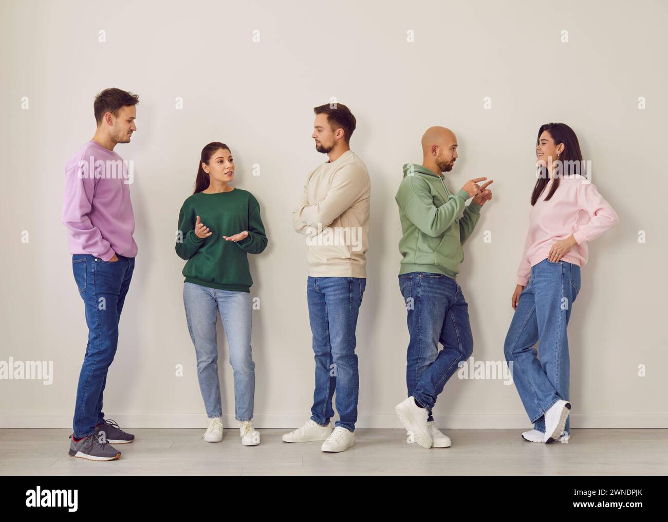Young Team Engaged In Group Meeting Stock Photo