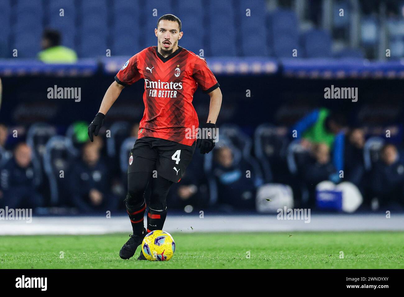 Milan's Algerian midfielder Ismael Bennacer controls the ball during the Serie A football match SS Lazio vs AC Milan at Olimpico Stadium on March 01, 2024, in Rome. Stock Photo