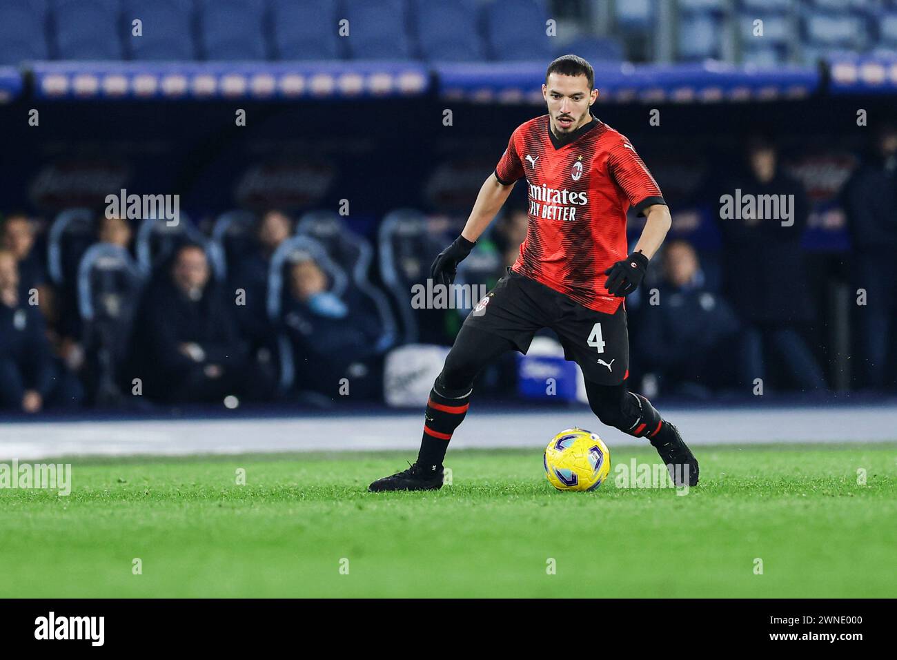 Milan's Algerian midfielder Ismael Bennacer controls the ball during the Serie A football match SS Lazio vs AC Milan at Olimpico Stadium on March 01, 2024, in Rome. Stock Photo
