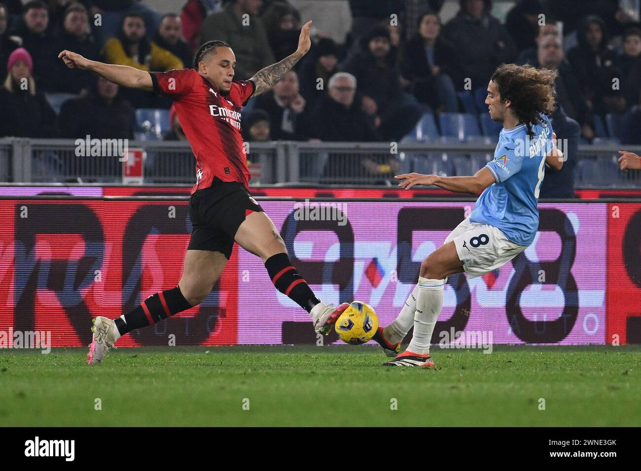 Rome, Italy. 01st Mar, 2024. Noah Okafor of A.C. Milan and Matteo Guendouzi of S.S. Lazio during the 27th day of the Serie A Championship between S.S. Lazio vs A.C. Milan, 1 March 2024 at the Olympic Stadium in Rome. Credit: Independent Photo Agency/Alamy Live News Stock Photo