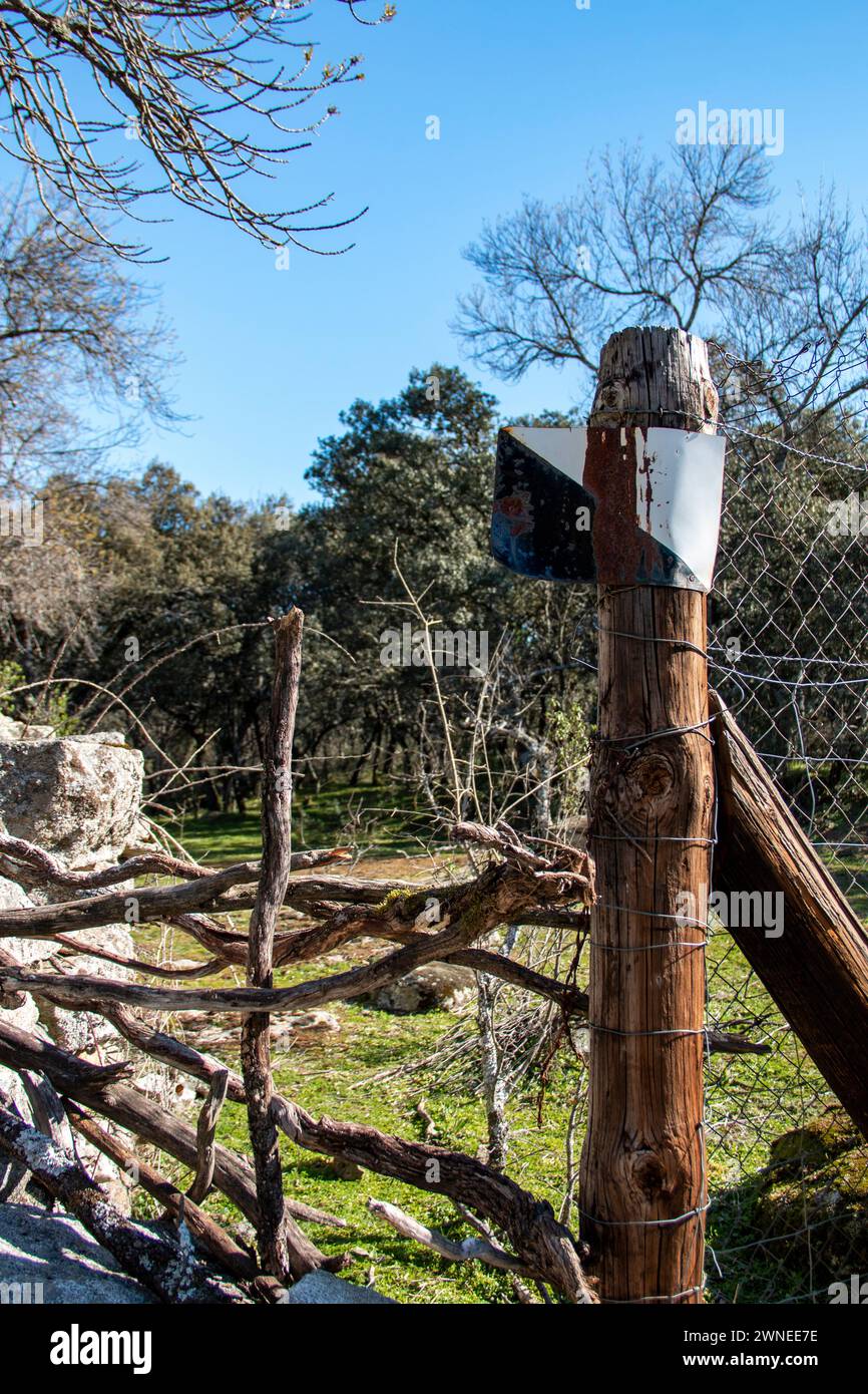 'Private hunting reserve' sign on a country property where it is delimited by metal fences Stock Photo