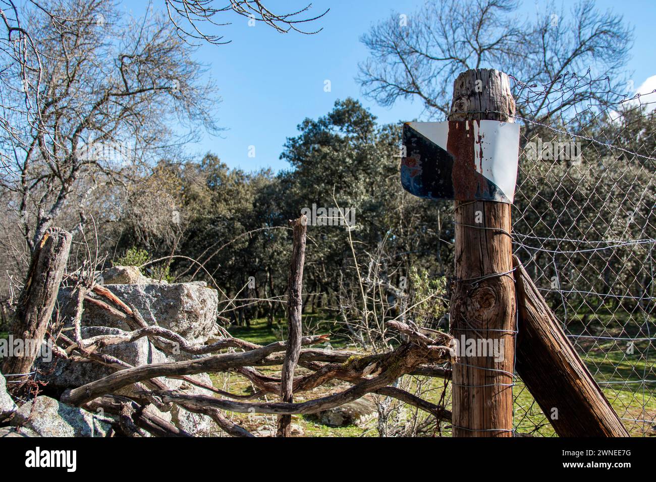 'Private hunting reserve' sign on a country property where it is delimited by metal fences Stock Photo