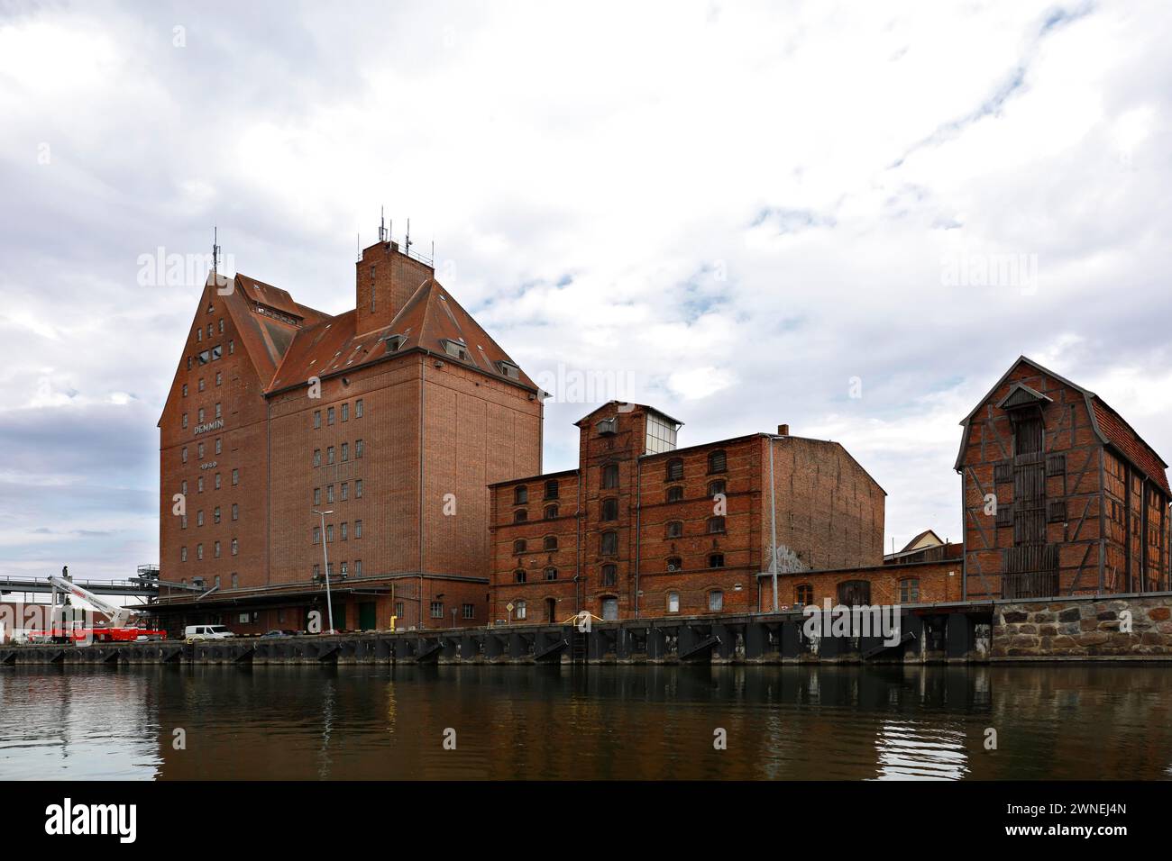 Warehouse building at the harbour of the Hanseatic town of Demmin on the River Peene, Peene Valley River Landscape nature park Park Stock Photo