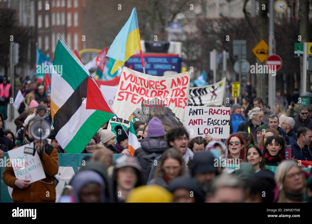 People during the Stand Together solidarity march in Dublin. The ...
