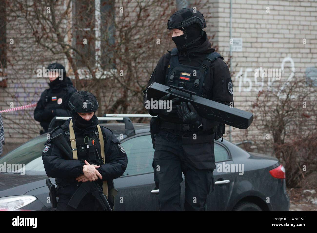 Saint Petersburg, Russia. 02nd Mar, 2024. Police officers are seen near a damaged residential building after an alleged drone attack, which was reported by local media at Krasnogvardeisky district. The Russian Ministry of Emergency Situations take security measures around the building. Credit: SOPA Images Limited/Alamy Live News Stock Photo