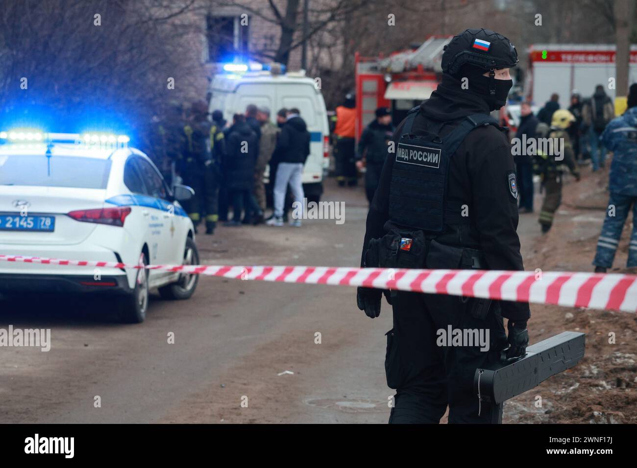 Saint Petersburg, Russia. 02nd Mar, 2024. A policeman is seen around the damaged residential building after an alleged drone attack, which was reported by local media at Krasnogvardeisky district. The Russian Ministry of Emergency Situations take security measures around the building. Credit: SOPA Images Limited/Alamy Live News Stock Photo