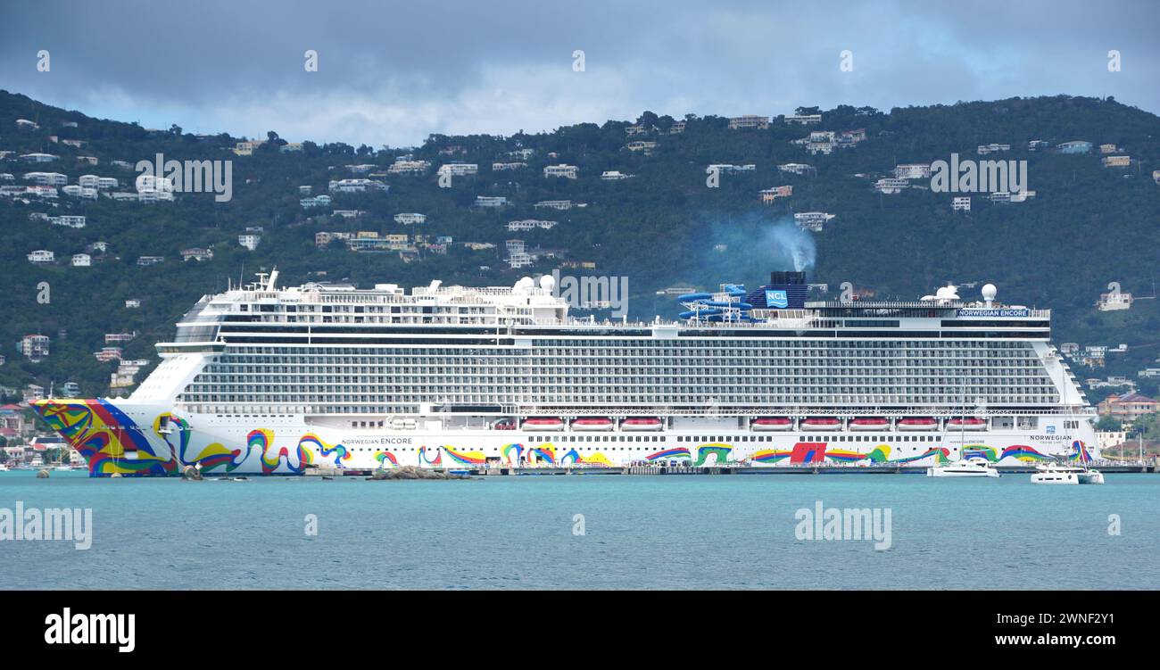 St Thomas, U.S Virgin Islands - February 21, 2024 - The Norwegian Encore cruiseship docked on the harbor on a sunny day Stock Photo