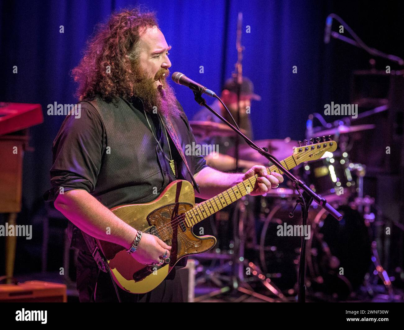 Shane Sanders on rhythm guitar & vocals Stock Photo