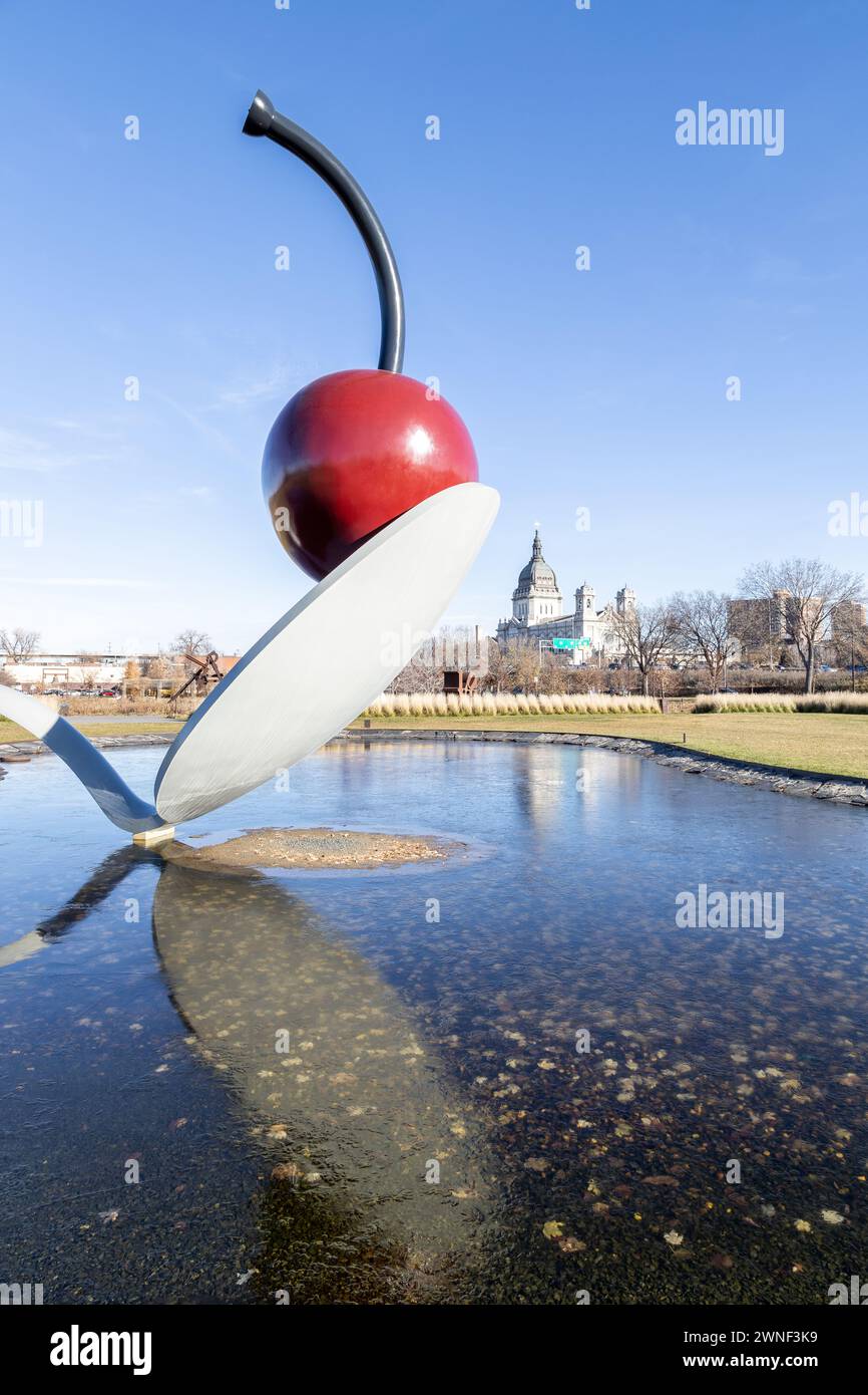 The iconic "Spoonbridge and Cherry" sculpture rests in the Minneapolis Sculpture Garden. Stock Photo