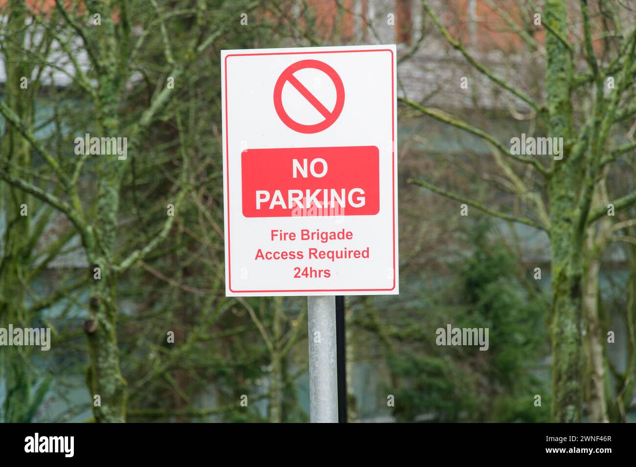 Private parking sign fire brigade access required Stock Photo