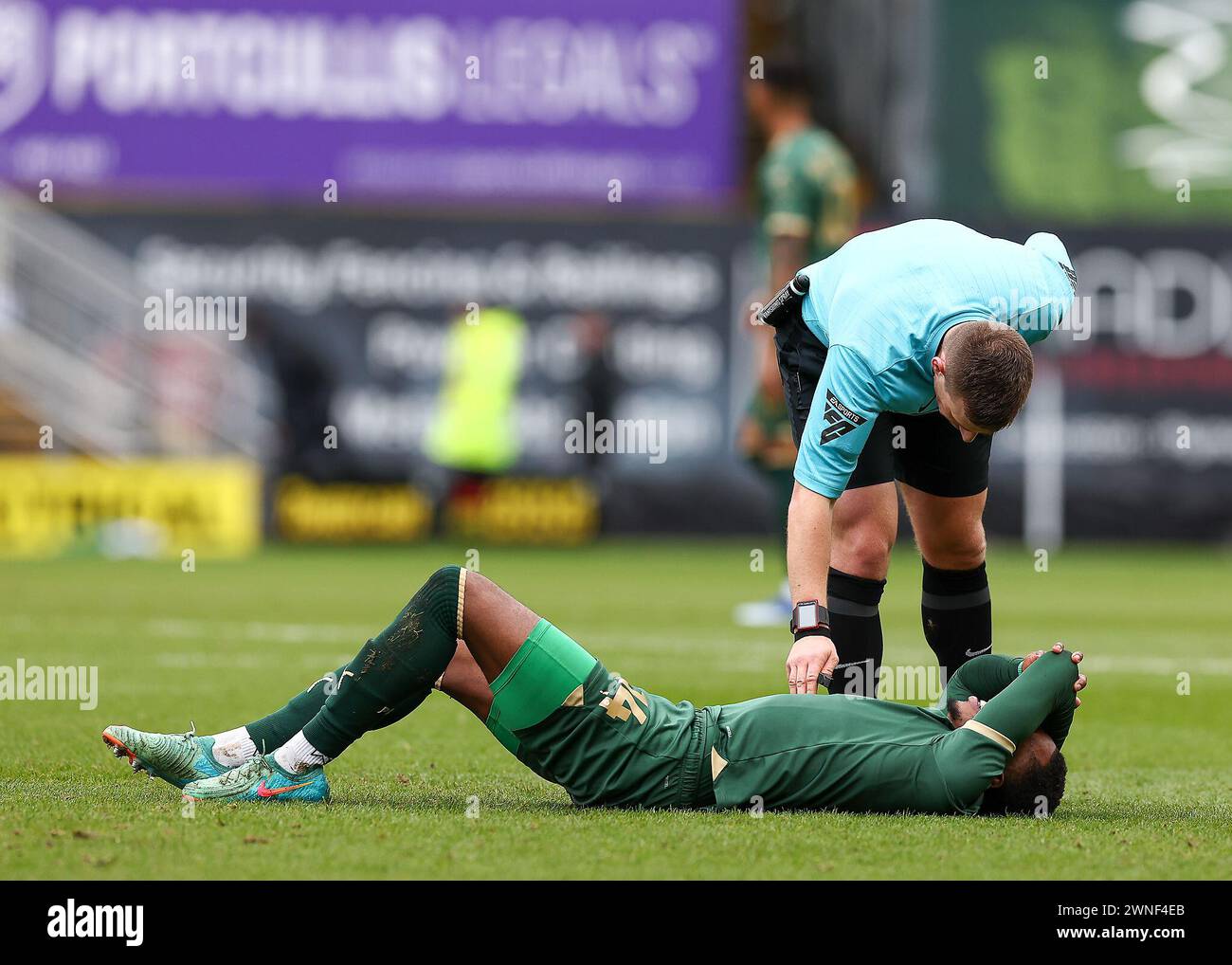 Mickel Miller of Plymouth Argyle is injured  during the Sky Bet Championship match Plymouth Argyle vs Ipswich Town at Home Park, Plymouth, United Kingdom, 2nd March 2024  (Photo by Stan Kasala/News Images) Stock Photo