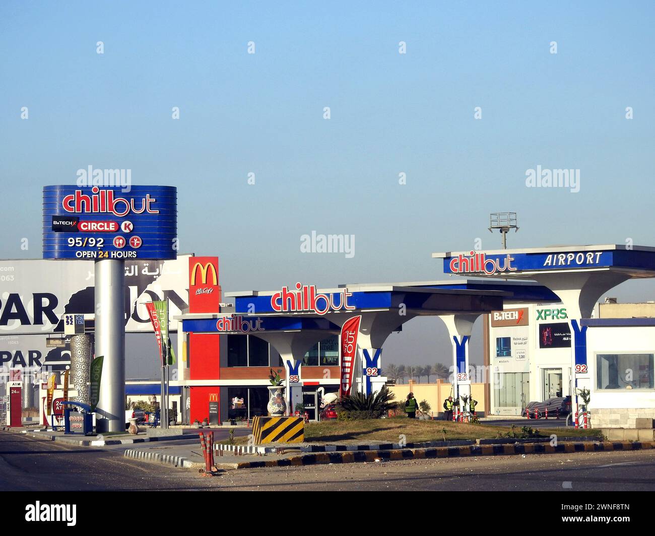 Cairo, Egypt, December 16 2023: Chillout airport gas and oil station at the daytime, a petrol gas station near Cairo airport with circle K stores, McD Stock Photo