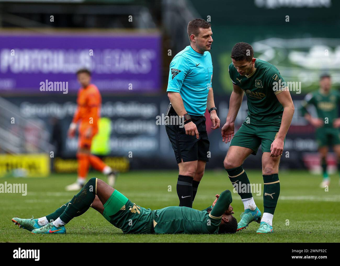 Mickel Miller of Plymouth Argyle is injured  during the Sky Bet Championship match Plymouth Argyle vs Ipswich Town at Home Park, Plymouth, United Kingdom, 2nd March 2024  (Photo by Stan Kasala/News Images) Stock Photo