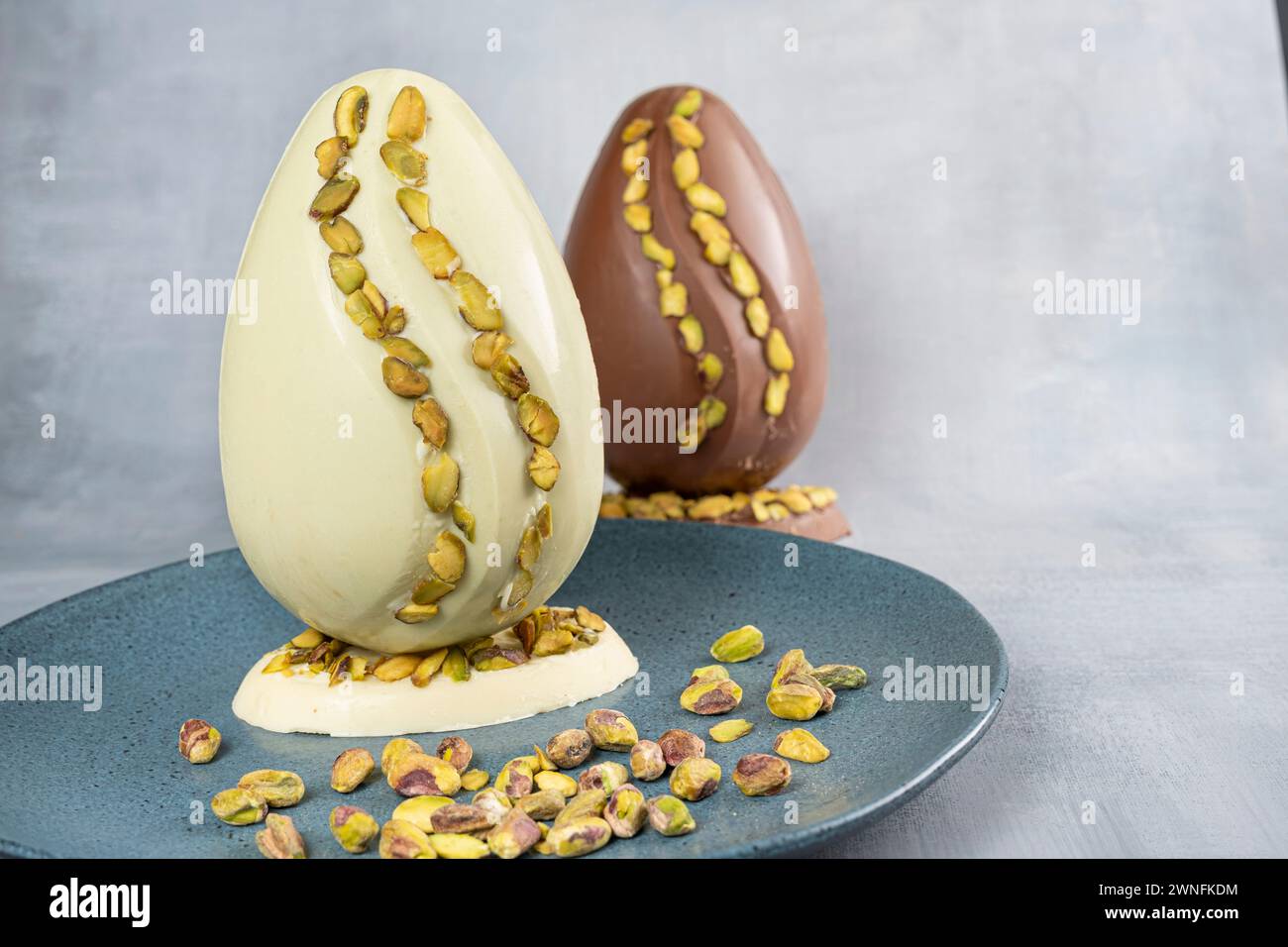 Assorted Easter eggs with pistachios, milk and dark chocolate_6. Stock Photo