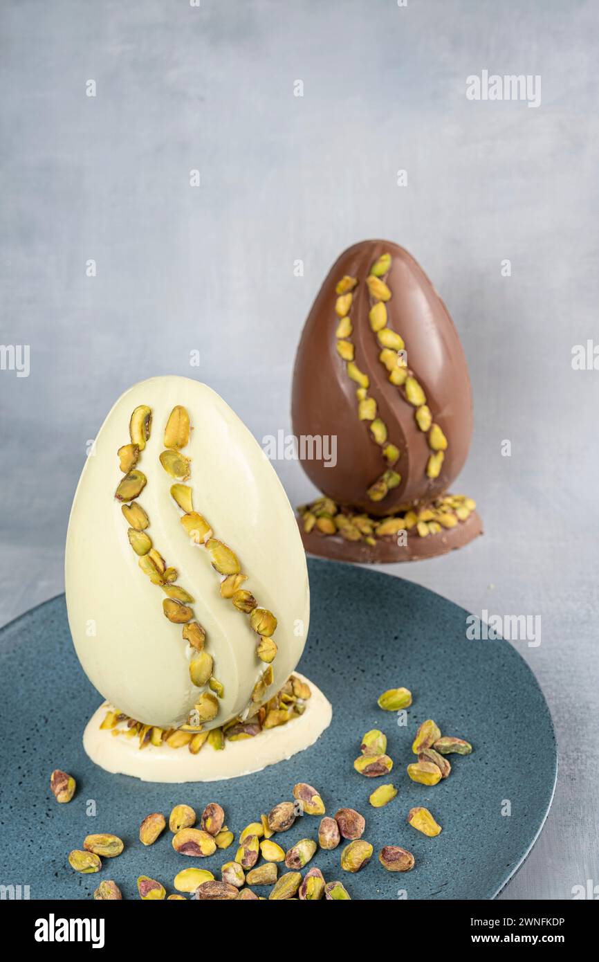 Assorted Easter eggs with pistachios, milk and dark chocolate_7. Stock Photo