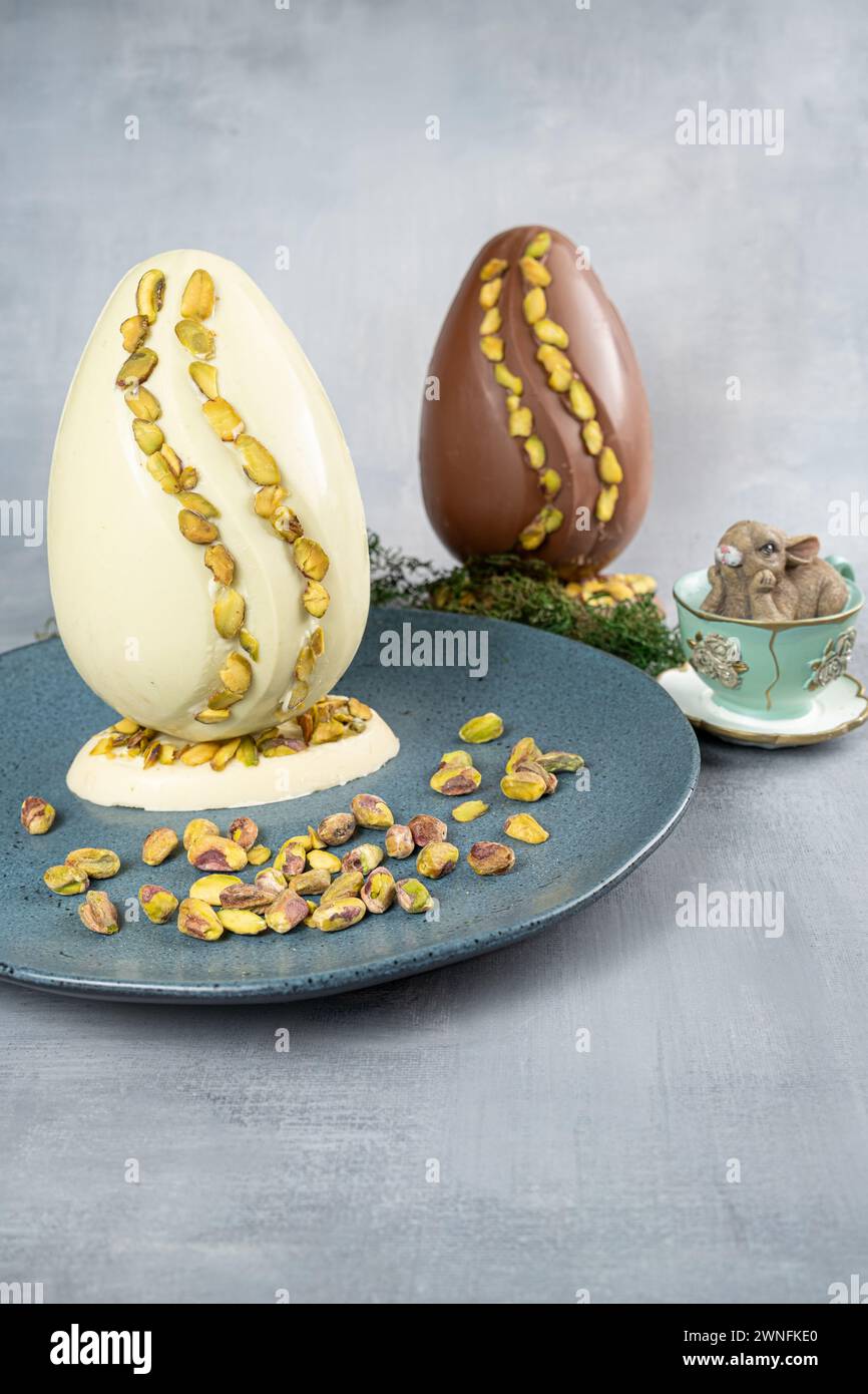 Assorted Easter eggs with pistachios, milk and dark chocolate_8. Stock Photo