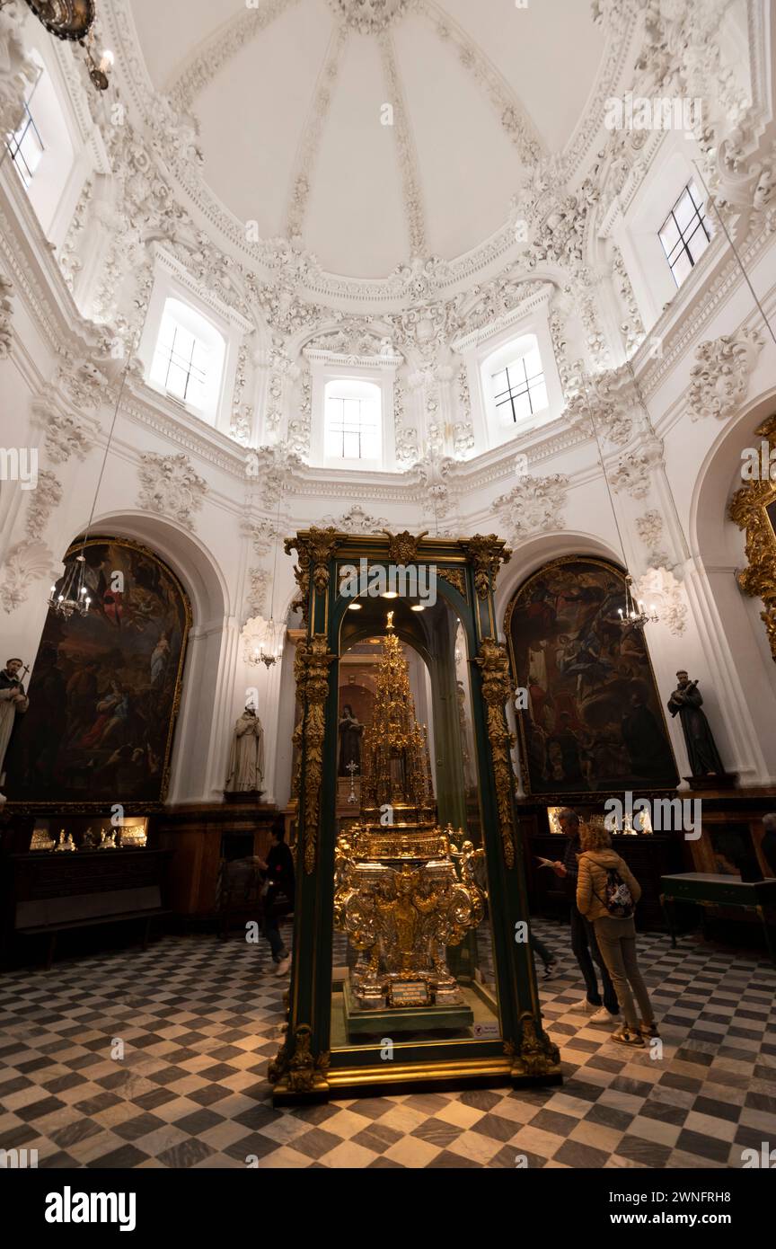 Mosque/ Cathedral of Cordoba  In the Chapel of Santa Teresa and Tesoro Catedralicio is the Great Monstrance, a tall glass case with a display of gold Stock Photo