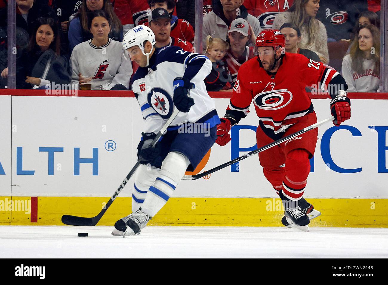 Winnipeg Jets' Mason Appleton (22) controls the puck in front of